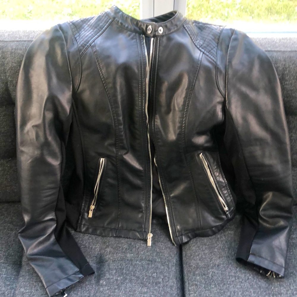 Black Express faux leather zippered jacket with zip pockets.